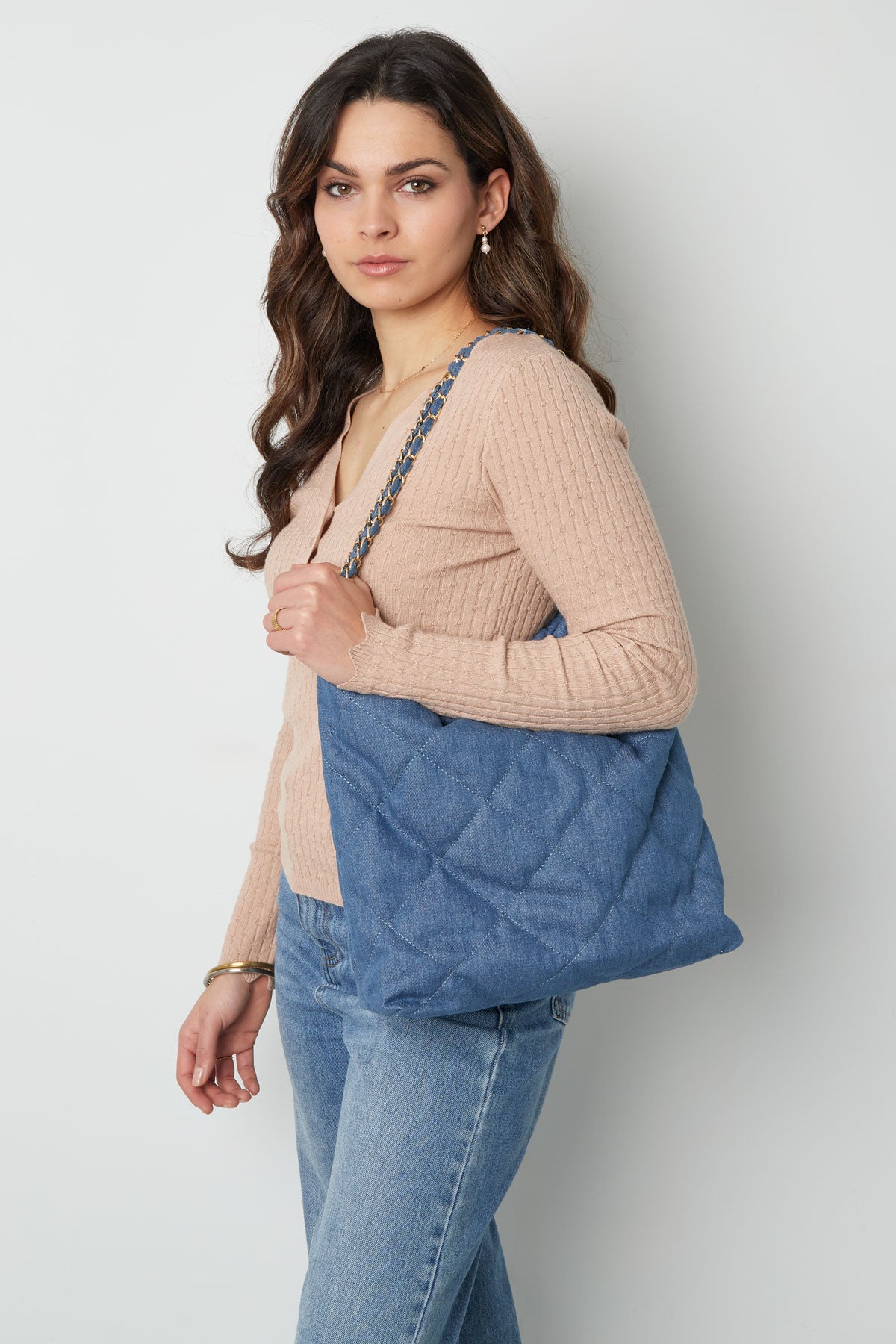 Denim bag with stitched motif and chain