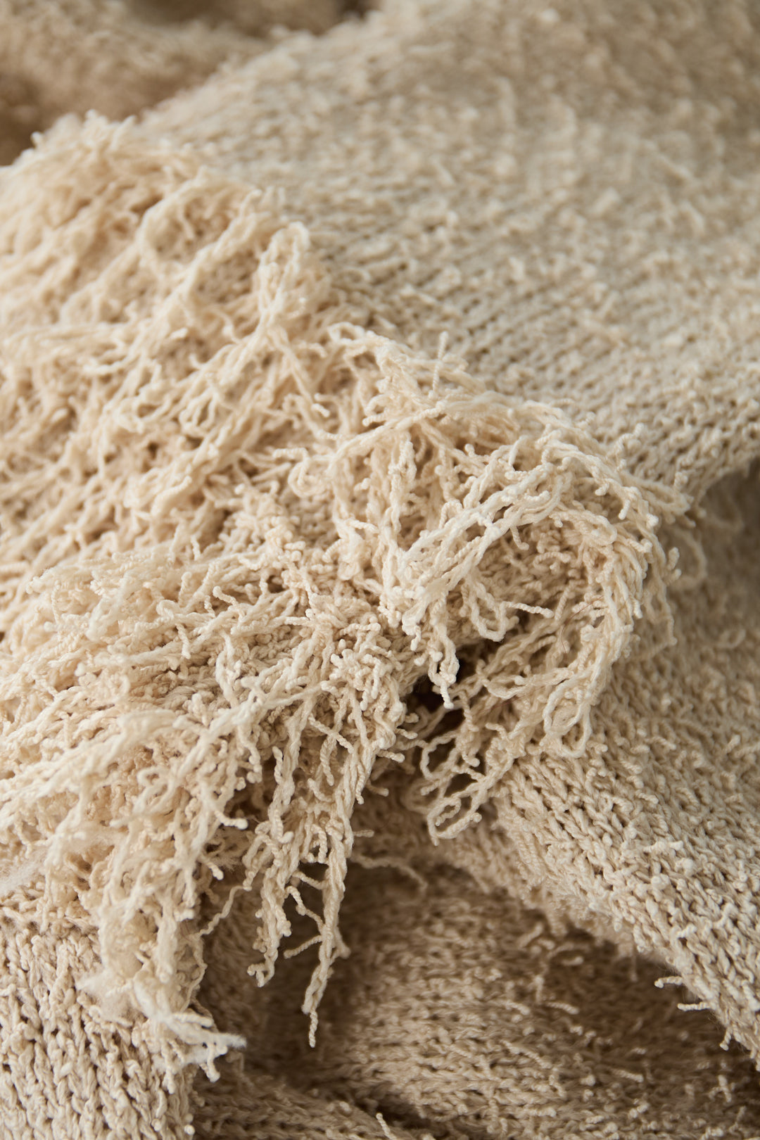 Cardigan with fringe sleeves